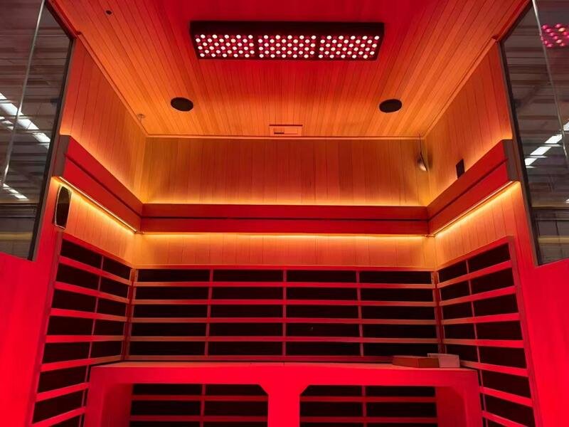 Private infrared sauna cabin with red light panel