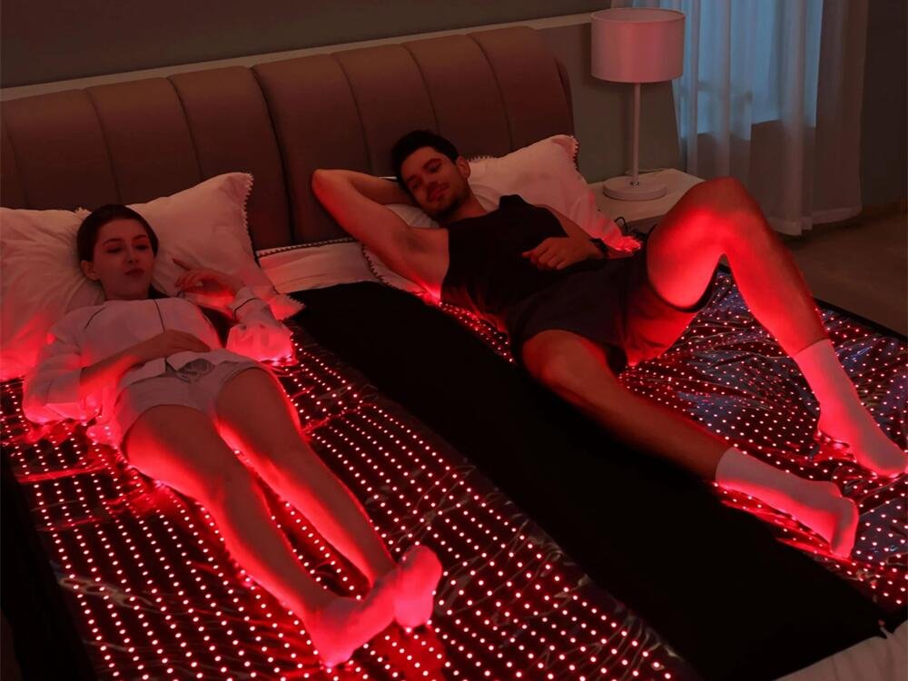 Recovery lounge with wall-mounted red light panel